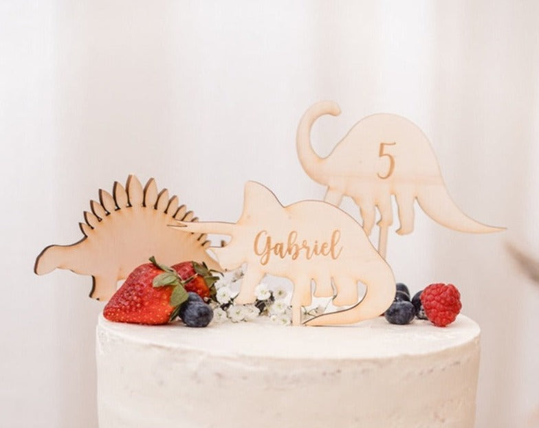 Decorazione per torta a forma di dinosauro