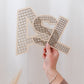 Rattan Buchstabe